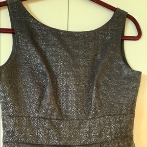 Sleeves Little black dress with silver glitter.